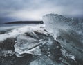 Minimalistic winter landscape on a frozen lake with cracked ice floes Royalty Free Stock Photo