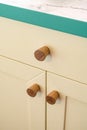 Minimalistic wooden handles on modern kitchen cabinet Royalty Free Stock Photo