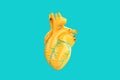 Minimalistic yellow human heart isolated over teal background. 3D Rendering