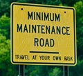 Cracked Bright Yellow Minimum Maintenance Sign