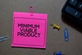 Minimum Viable Product write on sticky notes isolated on Office Desk Royalty Free Stock Photo