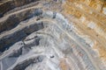 Mining from above. Industrial terraces on open pit mineral mine. Aerial view of opencast mining. Dolomite Mine Excavation.