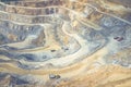 Mining from above. Industrial terraces on open pit mineral mine. Aerial view of opencast mining. Dolomite Mine Excavation.