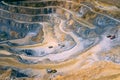 Mining from above. Industrial terraces on open pit mineral mine. Aerial view of opencast mining. Dolomite Mine Excavation.