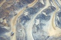 Mining from above. Industrial terraces on open pit mineral mine. Aerial view of opencast mining. Dolomite Mine Excavation.