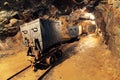 Mining cart in silver, gold, copper mine Royalty Free Stock Photo