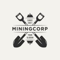 Mining corp and two crossed shovel vintage logo