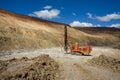 Mining drilling machine in ope cut mine. Royalty Free Stock Photo