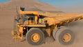 Mining dump truck transporting minerals from an open-pit mine Royalty Free Stock Photo