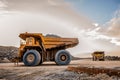 Mining dump trucks transporting Platinum ore for processing