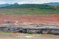 Mining dump trucks working in Lignite coalmine Royalty Free Stock Photo