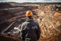 Mining Engineer Assessing Open-Pit Copper Mine in Autumn