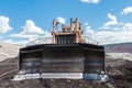 Mining Equipment or Mining Machinery, Bulldozer, wheel loader, shovels, loading of coal, ore on the dump truck Royalty Free Stock Photo