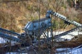 Mining equipment in mountains. Royalty Free Stock Photo