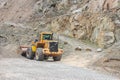 Mining excavator in stone pit