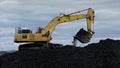Mining Excavator working in coal mine Royalty Free Stock Photo