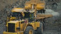 Mining machinery in the process of rock extraction and transport with caex Royalty Free Stock Photo