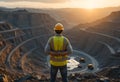 mining supervisor overlooking open pit mine site Royalty Free Stock Photo