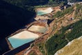 Mining waste basin beside a huge iron ore mine Royalty Free Stock Photo