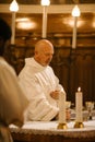 Ministers Leading The Eucharist, Sacred Christian Ceremony Of the Sharing Of Bread And Wine To