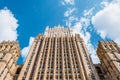 Ministry of Foreign Affairs of Russia style of Stalinist architecture against a blue sky with white clouds, view up. Royalty Free Stock Photo