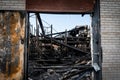 Burned down building wreckage in the morning after looting and minneapolis riots for George Floyd in Black Lives Matter protests Royalty Free Stock Photo