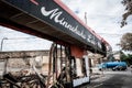 Burned local business now collapsed wreckage after looting and Minneapolis riots for George Floyd in Black Lives Matter protests