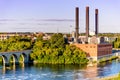 Minneapolis, MN, river and bridge near downtown buildings Royalty Free Stock Photo