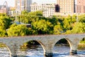 Minneapolis, MN, river and bridge with runner near downtown Royalty Free Stock Photo