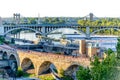 Minneapolis, MN, river and bridge with runner near downtown Royalty Free Stock Photo