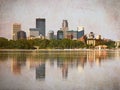 Minneapolis Skyscrapers Reflecting in Lake Calhoun with Vintage Effects Royalty Free Stock Photo