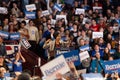 Scene from the heated rally of Bernie Sanders with the crowd holding banners actively cheering