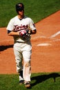 A Minnesota twin walks back to the dugout