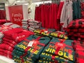 Display of Family PJs for Christmas on sale at a Macys store. Matching pajama sets,