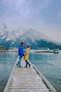 Minnewanka lake in Canadian Rockies in Banff Alberta Canada with turquoise water is surrounded by coniferous forests Royalty Free Stock Photo