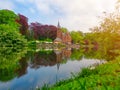 Minnewater castle at the Lake of Love in Bruges, Belgium Royalty Free Stock Photo