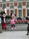 Minnie and Mickey Mouse greeting people in La Puerta del Sol Madrid Spain