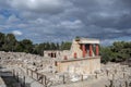 Minoan palace Knossos at Heraklion, Crete island, Greece. North Entrance with charging bull fresco and red columns Royalty Free Stock Photo