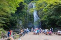 Minoh waterfall full of tourists take photo in summer and waiting for light up