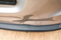 Minor dent at car rear door due to accident Royalty Free Stock Photo