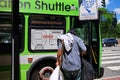 Minority Man Boarding Bus