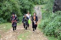 Minority Vietnamese women walking with a tourists