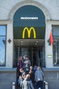 Minsk, Belarus, April 4, 2018: Visitors enter and exit from the McDonald`s restaurant.