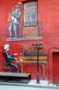 Graffiti on wall of house pianist, saxophonist, Red Yard, Minsk, Belarus Royalty Free Stock Photo