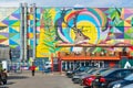 Street art on Oktyabrskaya street. Fragment of graffiti with natural motifs on wall of industrial building, Minsk, Belarus