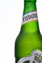 MINSK, BELARUS-AUGUST 23, 2016. Tuborg glass bottle beer on green background.