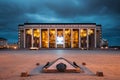 Minsk, Belarus. Building Of The Palace Of Republic And Zero Kilometer In Oktyabrskaya Square In Evening Night