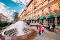 Minsk, Belarus. Children Play Near A Fountain. People Resting Walking On Lenin Street