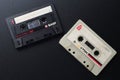 MINSK BELARUS-06/29/2020: Compact cassettes TDK D-C90, BASF Audio on a black background. Old white and black vintage audio cassett Royalty Free Stock Photo