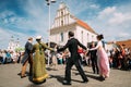 Minsk, Belarus. Couple of people dressed in clothes of the 19th